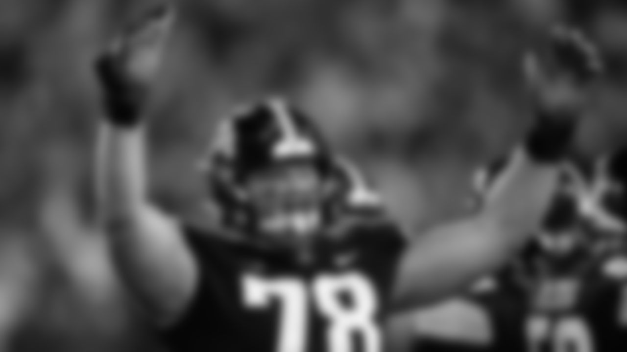 Iowa offensive lineman Mason Richman (78) celebrates at the end of an NCAA college football game against Illinois, Saturday, Nov. 18, 2023, in Iowa City, Iowa. Iowa won 15-13. (AP Photo/Charlie Neibergall)