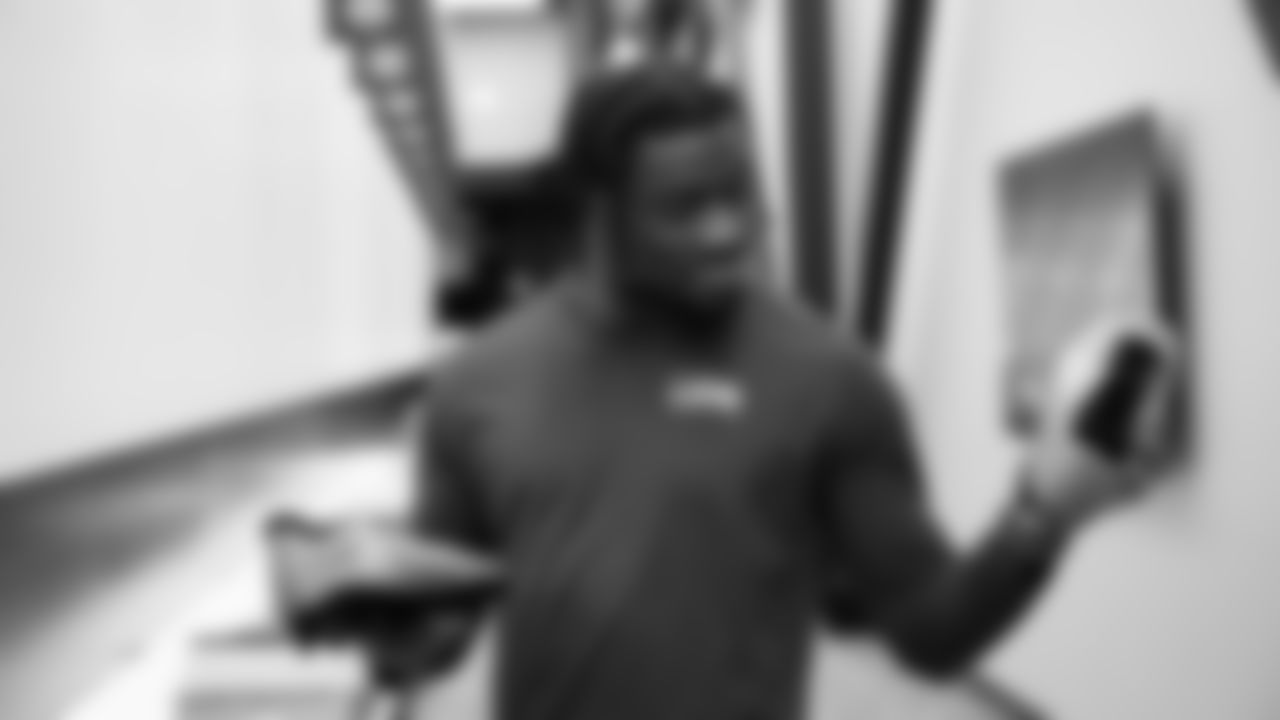 Seahawks quarterback Jalen Milroe (6) unboxed his My Cause My Cleats at the Virginia Mason Athletic Center.