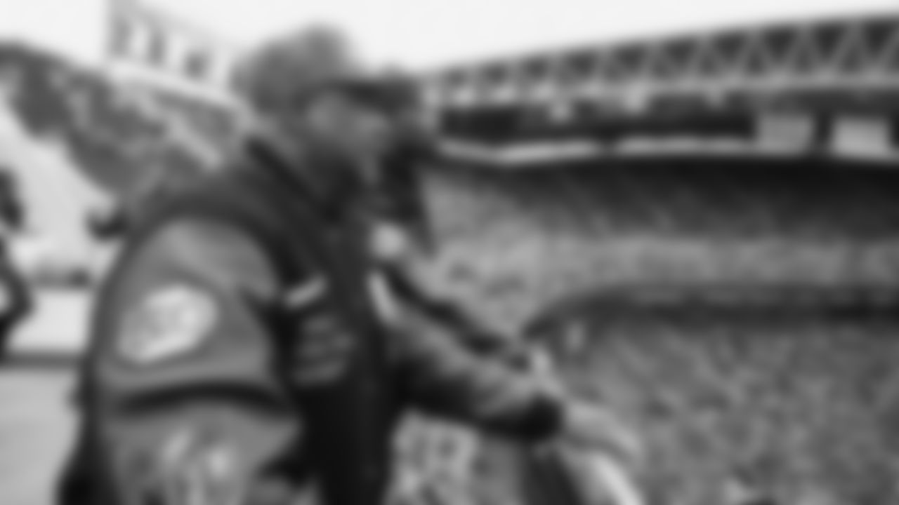 Seahawks Legends Rufus Porter and John L. Williams raise 12 flag in week 15 on December 14, 2025