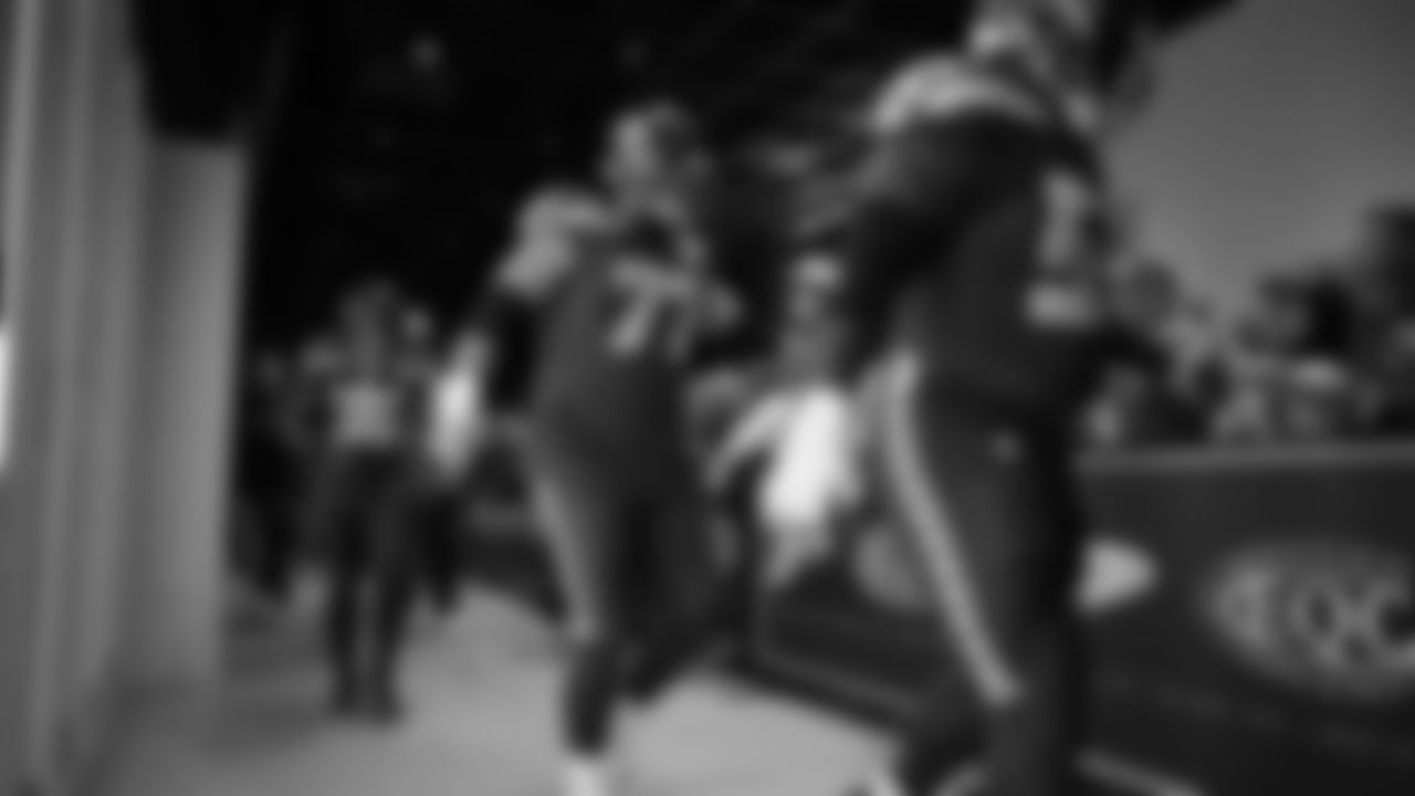 Seahawks guard Bryce Cabeldue (77) walks through the Emerald Queen Casino tunnel club at Lumen Field for the Week 7 matchup vs. the Houston Texans.