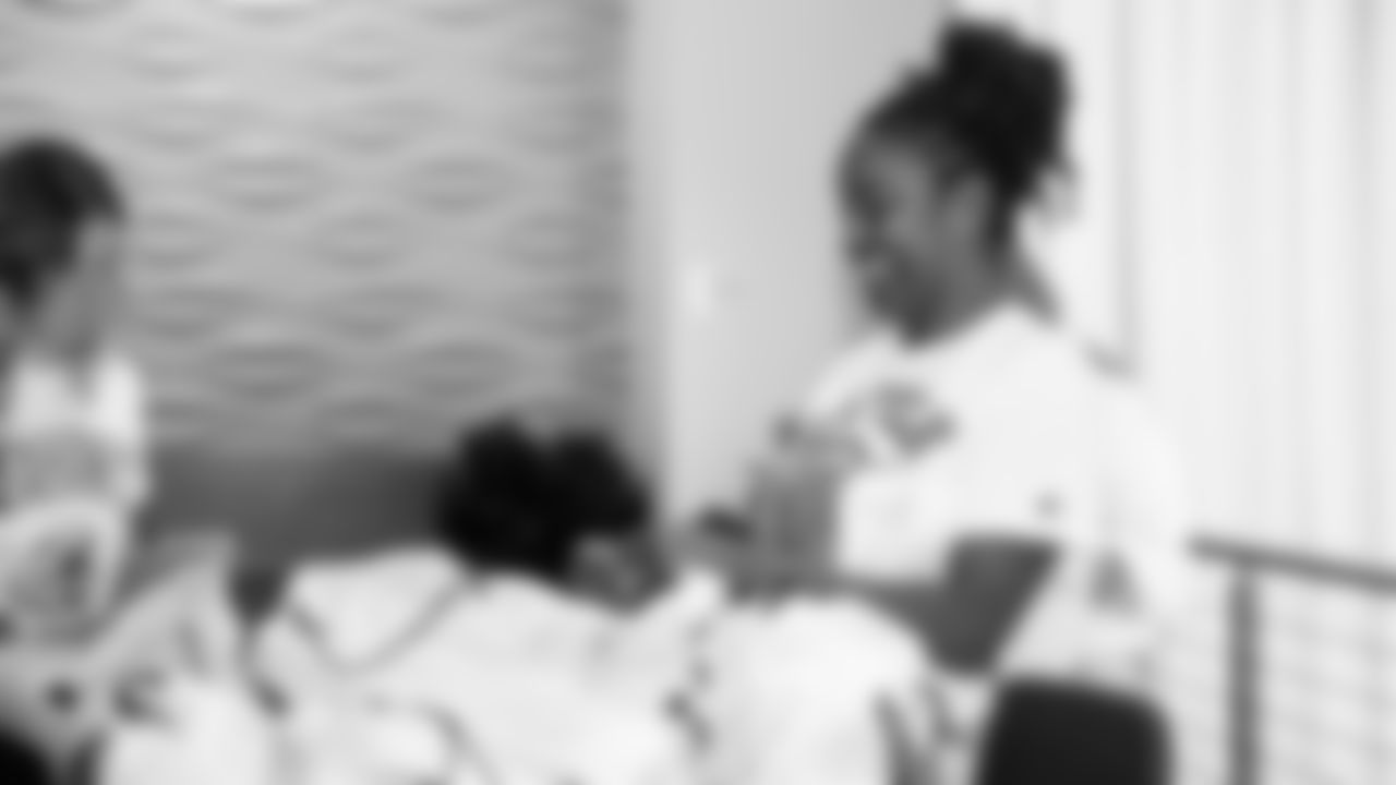 The Seahawks Women's Association packed girls flag kits and hosted a free girls flag football camp at the Seahawks training facility on Saturday, November 8, 2025.