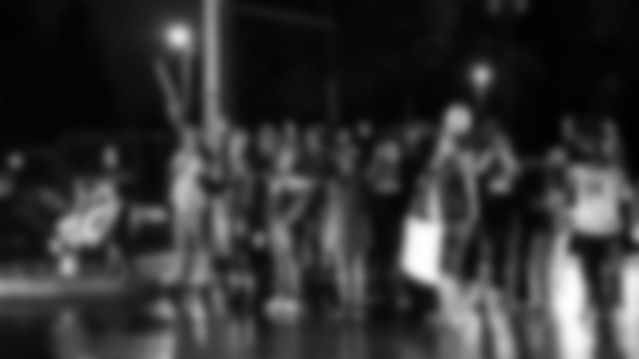 The Seahawks did not return to the Virginia Mason Athletic Center until after midnight but were greeted by a large group of 12s who braved the rain and cold to welcome them home.