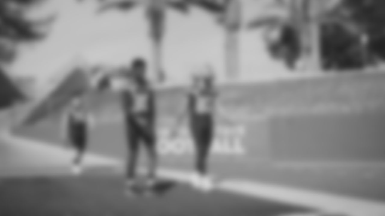 Seahawks running back Cam Akers (30) and wide receiver Cody White (82) during the Super Bowl LX team photo on February 7, 2026.