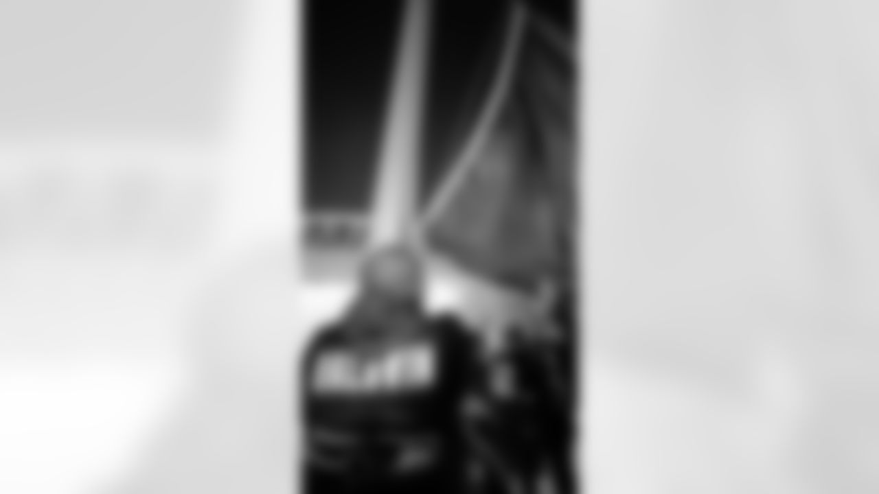 Seahawks Legend Doug Baldwin raising the flag in the 2025 Divisional Round on January 17, 2025.