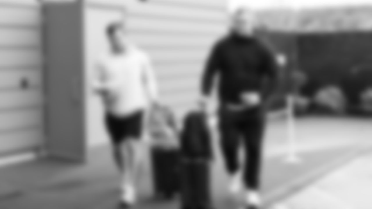 Seahawks offensive lineman Mason Richman (78) and defensive tackle Rylie Mills (98) departed the Virginia Mason Athletic Center on Friday, December 5, 2025 for the Week 14 trip to Atlanta.