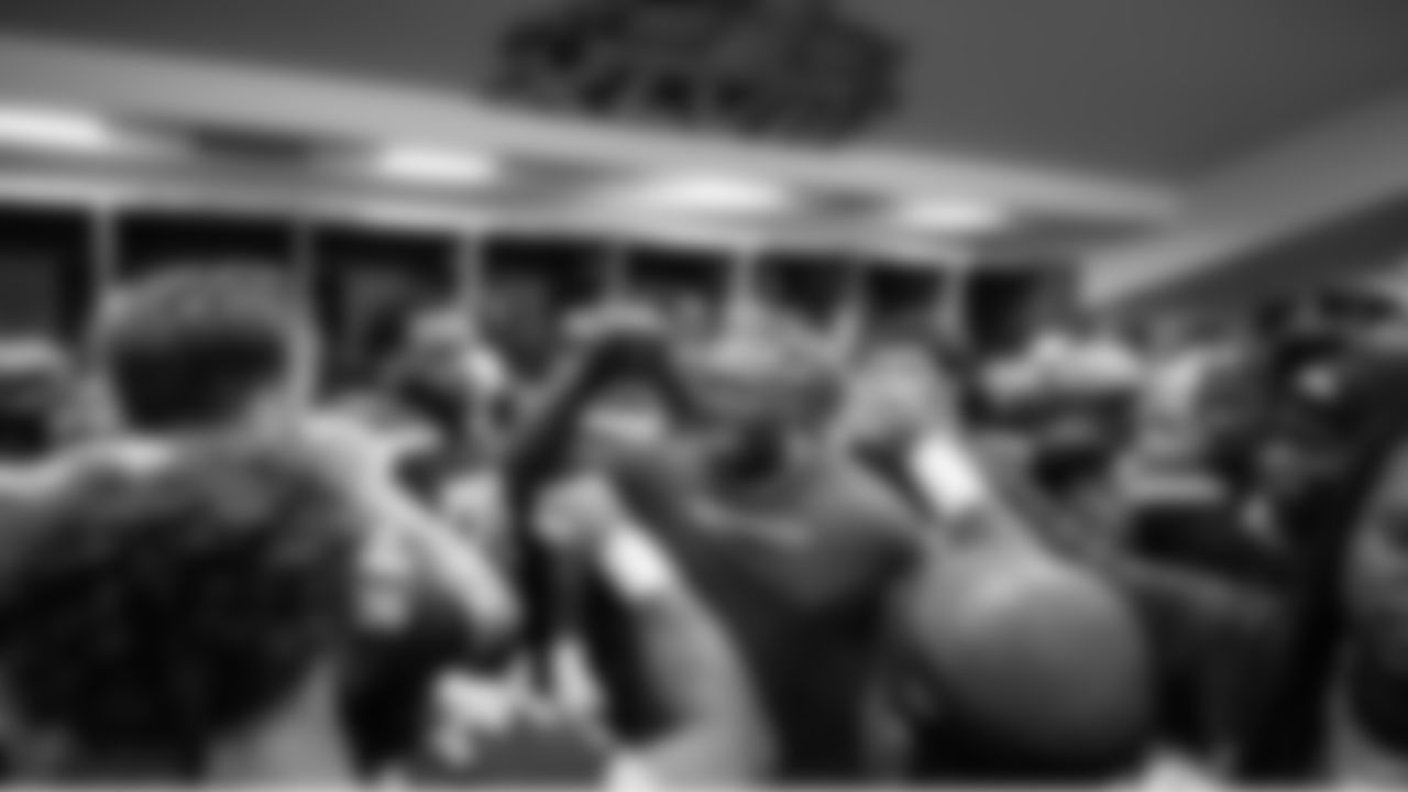 Jarran Reed brings the team up before they leave the locker room for kickoff.