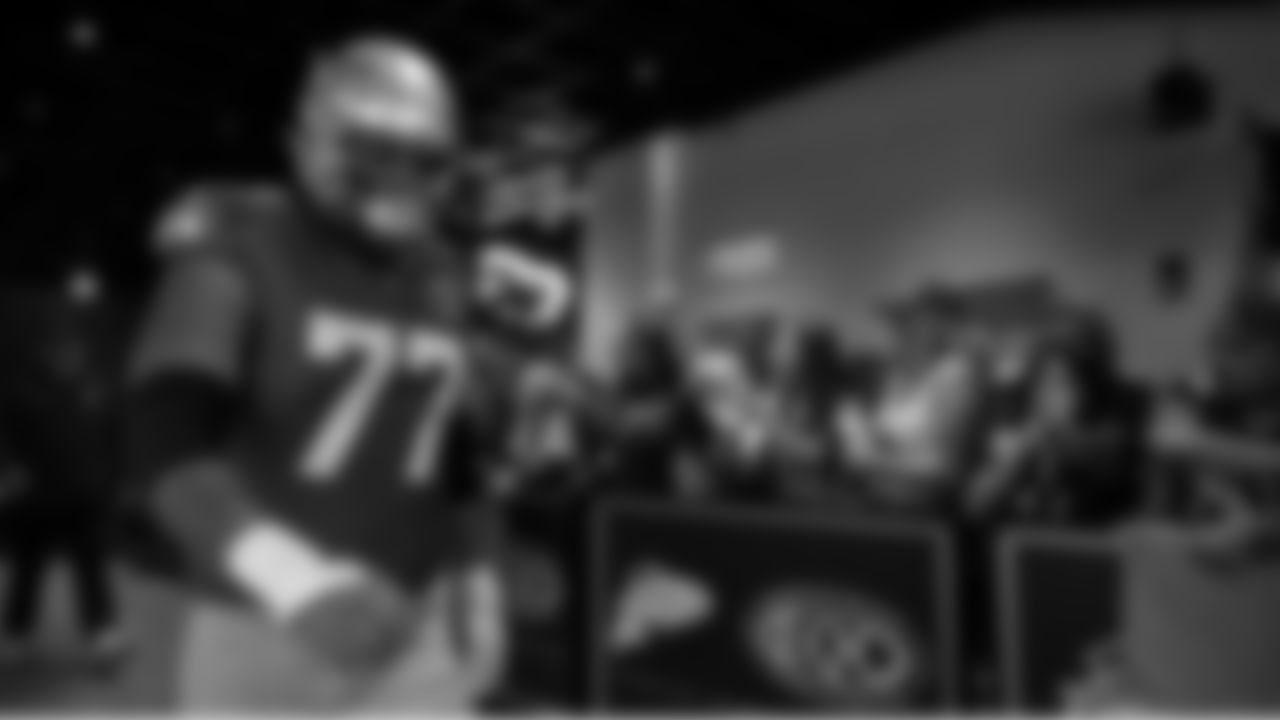 Seahawks guard Bryce Cabeldue (77) walks through the Emerald Queen Casino tunnel club at Lumen Field for the Week 5 matchup vs. the Buccaneers.