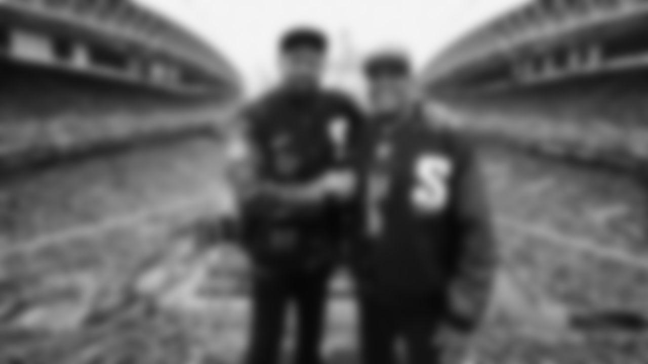 Seahawks Legends Rufus Porter and John L. Williams raise 12 flag in week 15 on December 14, 2025