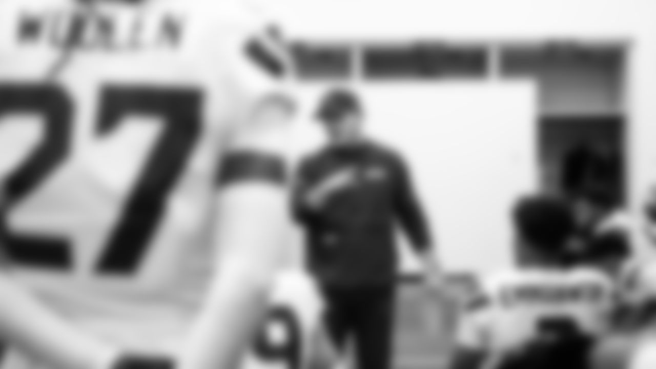 Seahawks head coach Mike Macdonald instructs the defense at halftime.