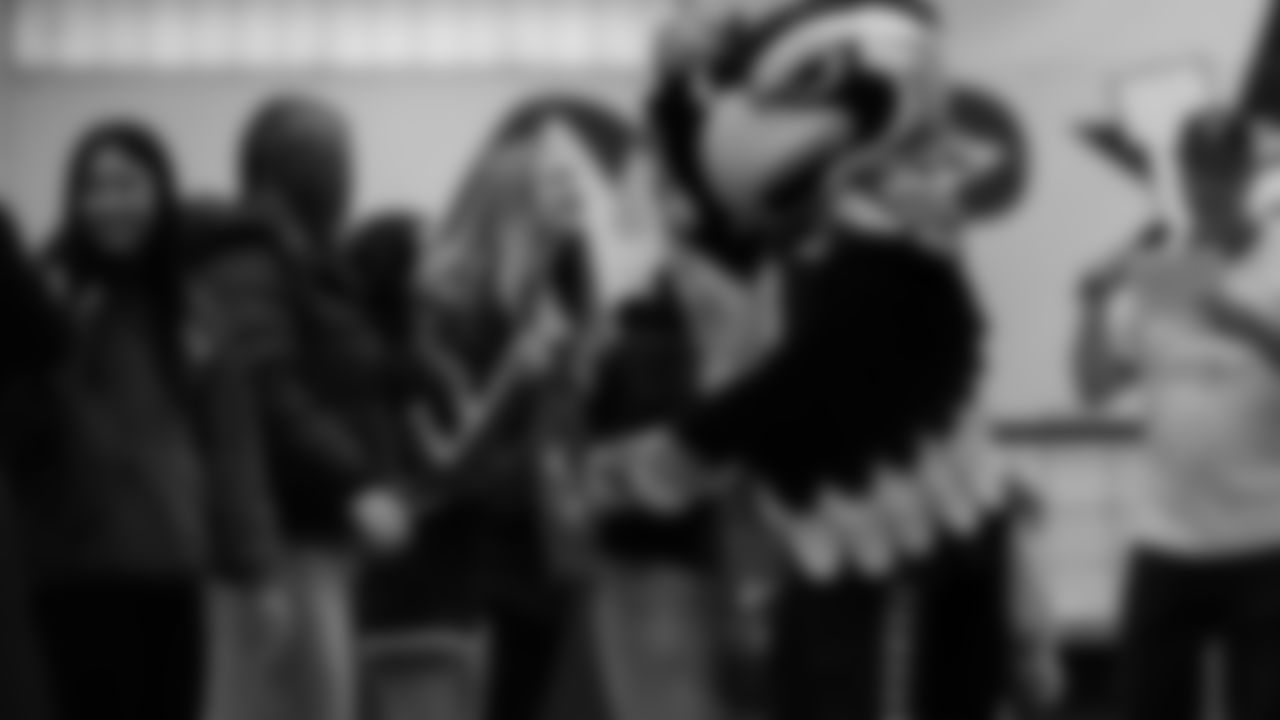 The Seahawks, Safeway, Delta Air Lines, Coca-Cola, and Head & Shoulders surprised Washington High School with a grant to support their girls flag football program on Tuesday, November 25, 2025.