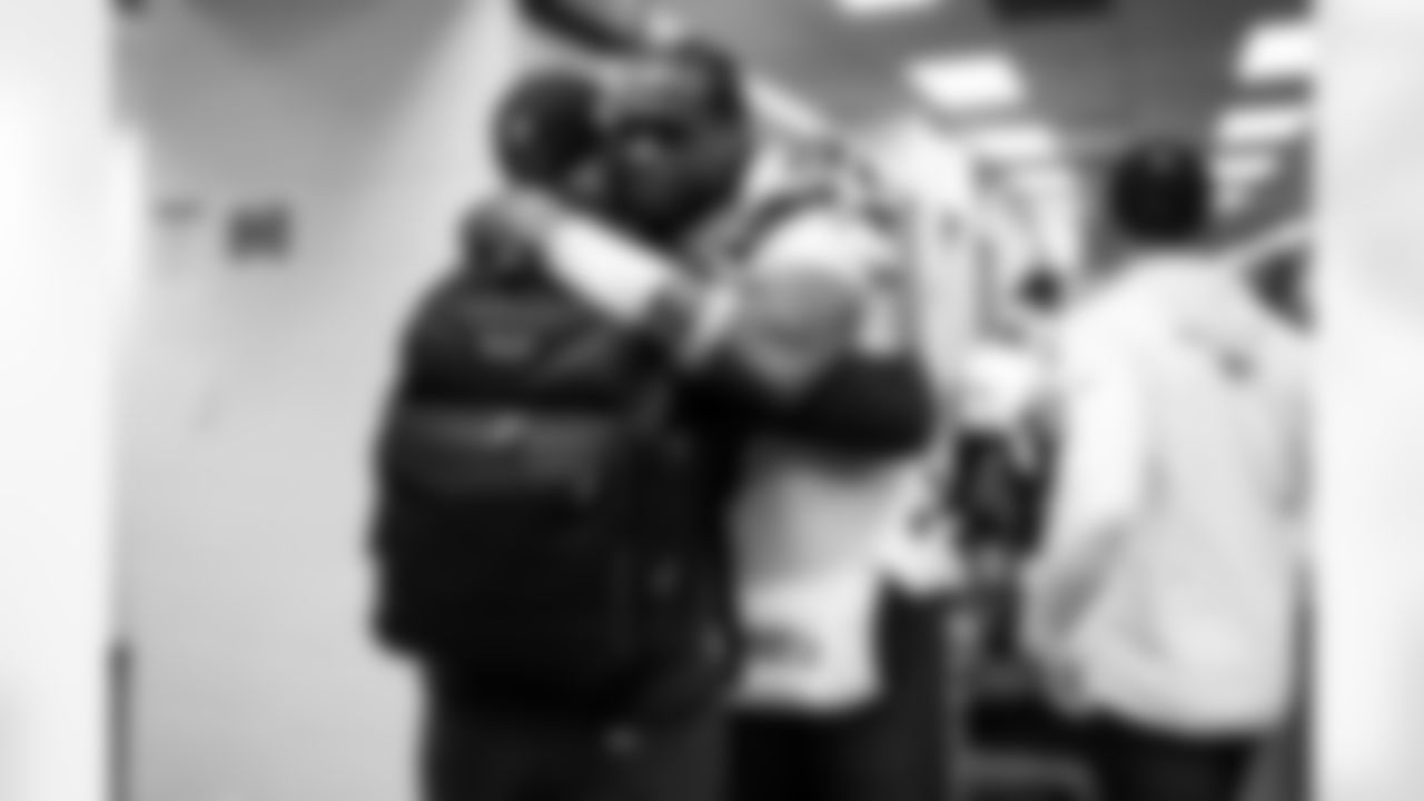 Seahawks quarterback Geno Smith (7) and offensive coordinator Ryan Grubb celebrate the Week 17 win over the Chicago Bears on Thursday, December 27, 2024.