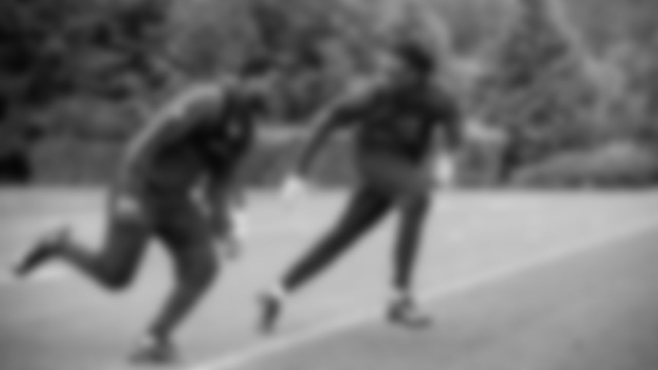 Seahawks cornerback Riq Woolen (27) and cornerback Devon Witherspoon (21) participated in a workout on May 21, 2025 at the Virginia Mason Athletic Center.