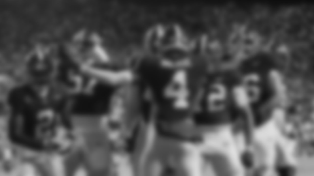 Alabama quarterback Jalen Milroe (4) celebrates a touchdown carry in the second half an NCAA college football game against LSU in Baton Rouge, La., Saturday, Nov. 9, 2024. (AP Photo/Gerald Herbert)