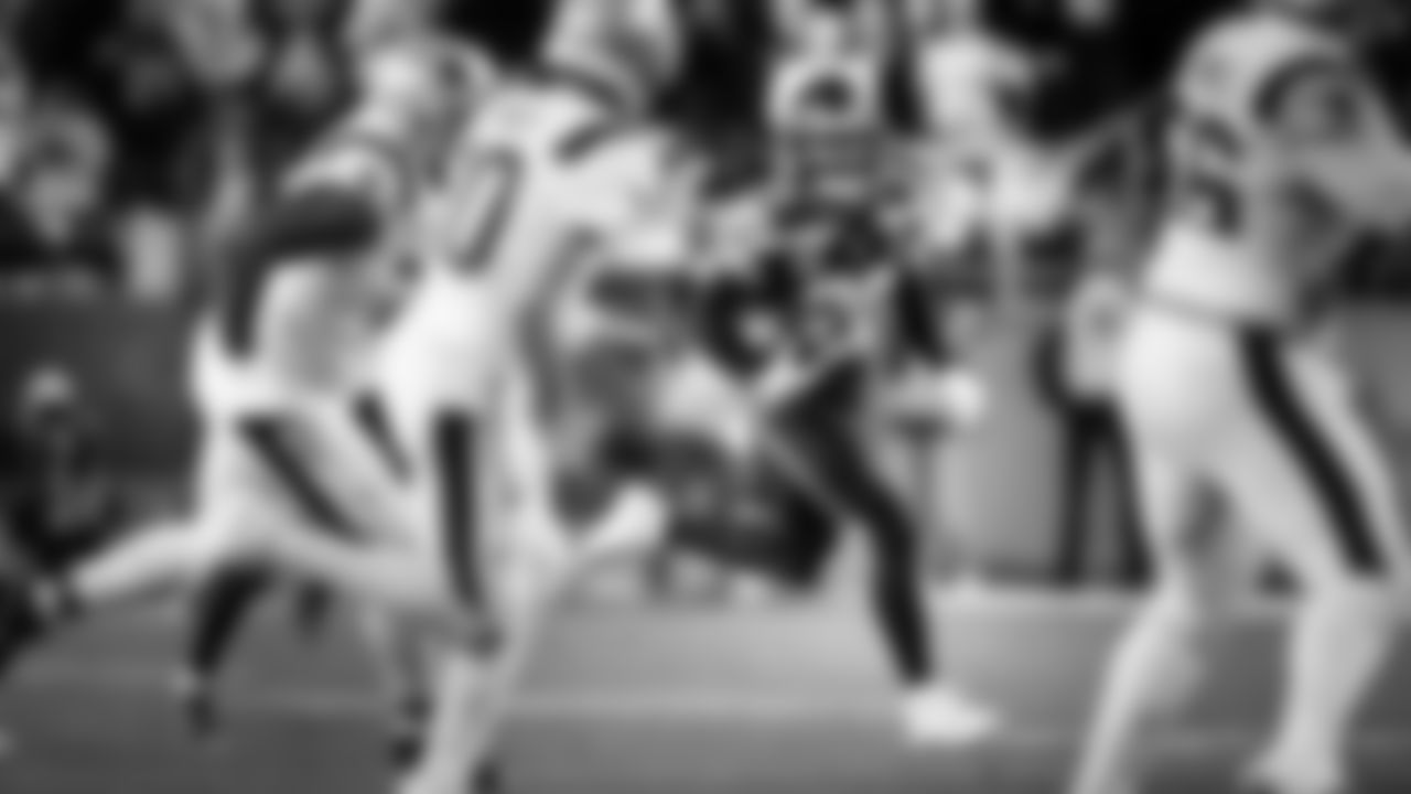 Seahawks safety Julian Love returns an interception in the second half.