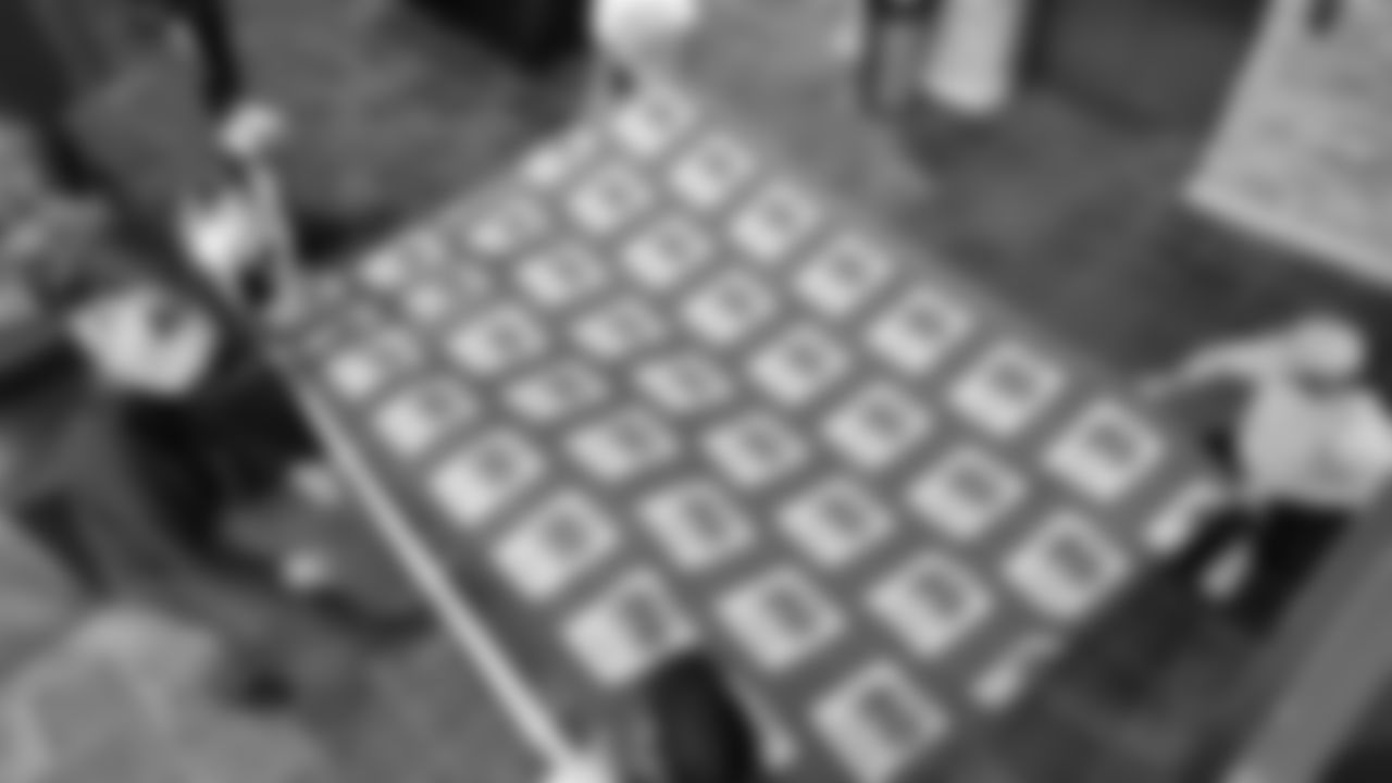 The Seahawks Women's Association packed girls flag kits and hosted a free girls flag football camp at the Seahawks training facility on Saturday, November 8, 2025.