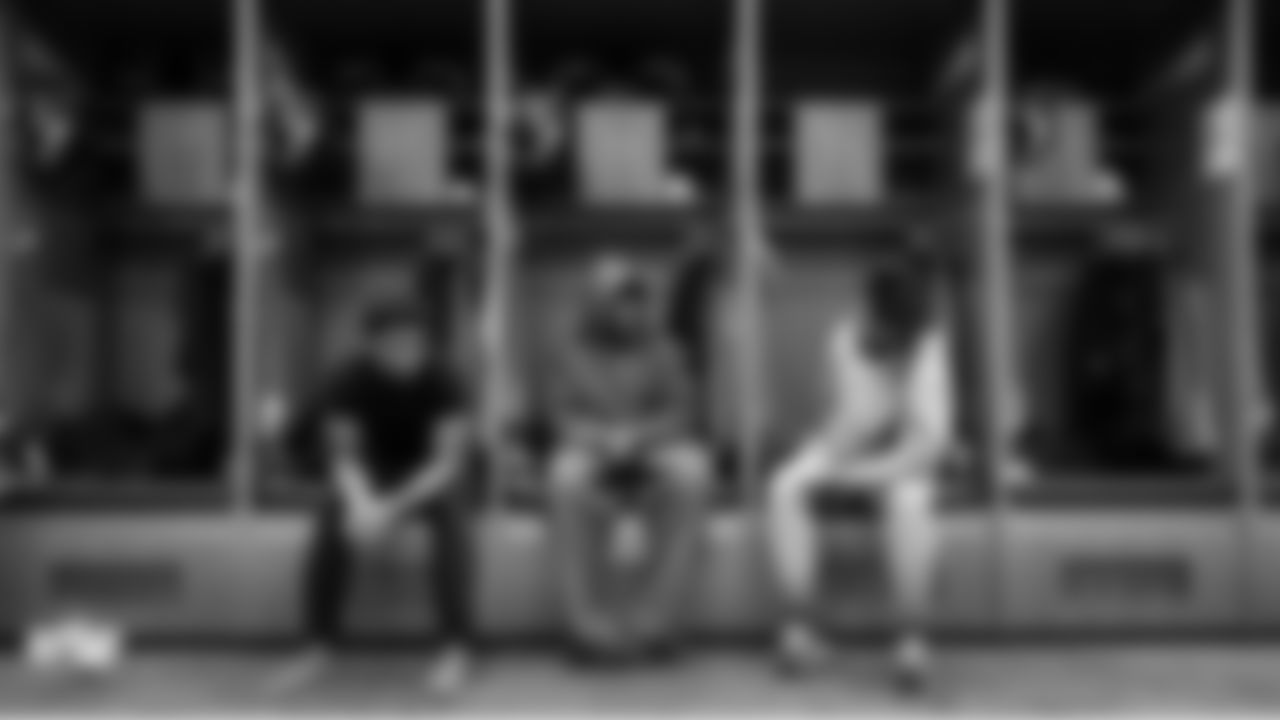 Seahawks defensive backs Nick Emmanwori, D'Anthony Bell and Shaquill Griffin chat at their lockers upon arriving at the stadium.