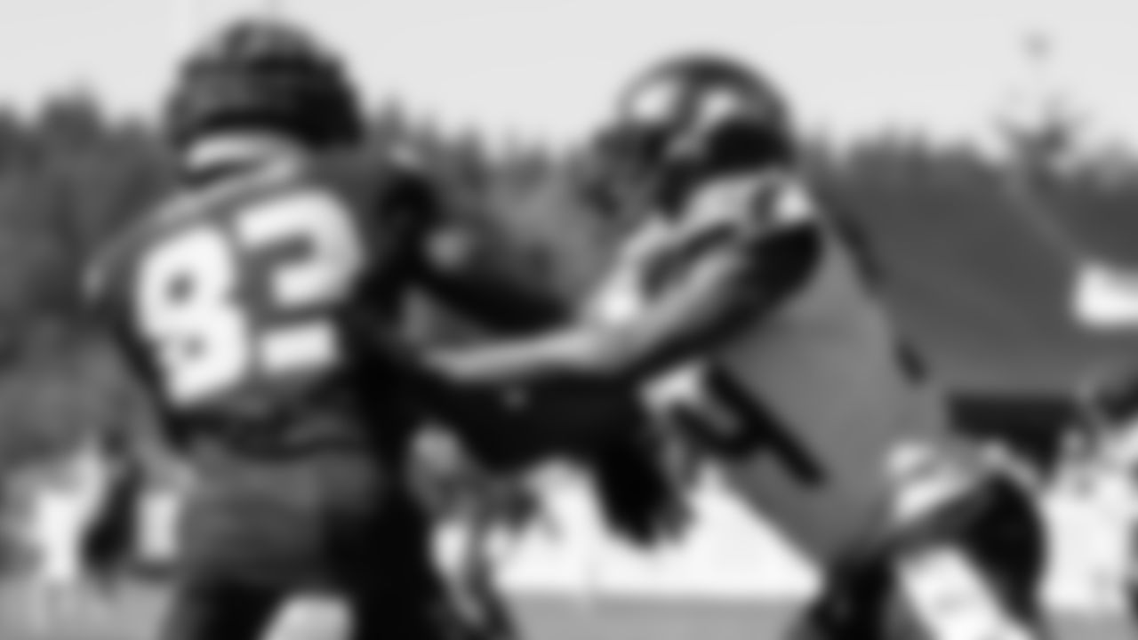 Seahawks cornerback Shaquill Griffin (24) and wide receiver Dareke Young (83) practiced on August 12, 2025 at the Virginia Mason Athletic Center.