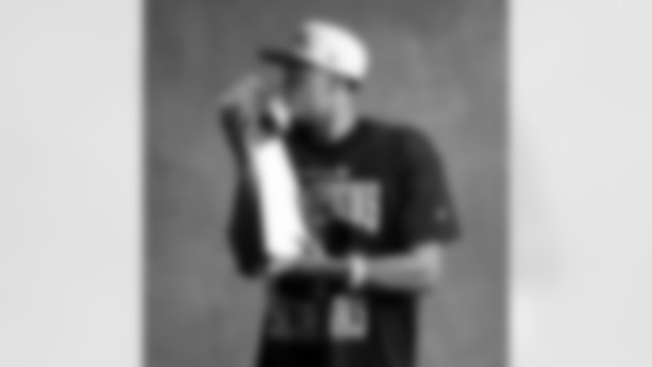 Seahawks wide receiver Jaxon Smith-Njigba (11) with the Lombardi Trophy after winning Super Bowl LX.