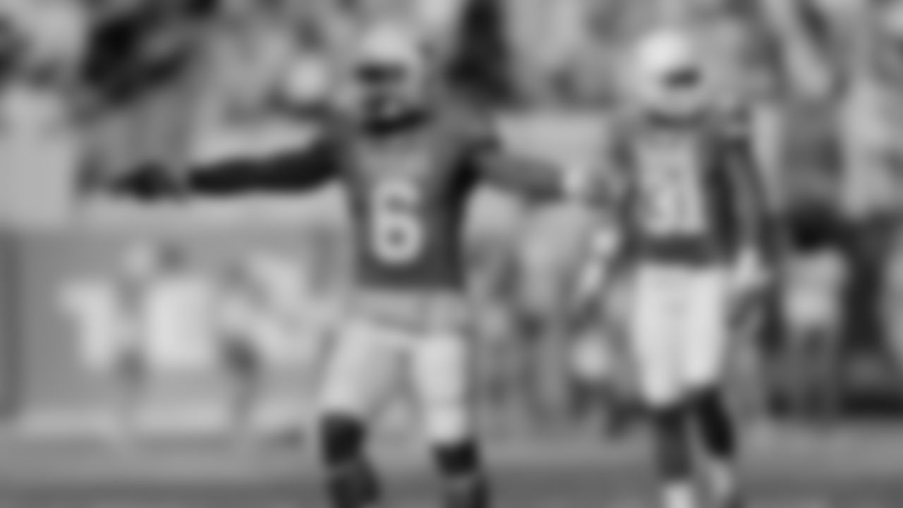Texas' Quandre Diggs (6) signals during the second half of an NCAA college football game against Baylor, Saturday, Oct. 4, 2014, in Austin, Texas. (AP Photo/Eric Gay)