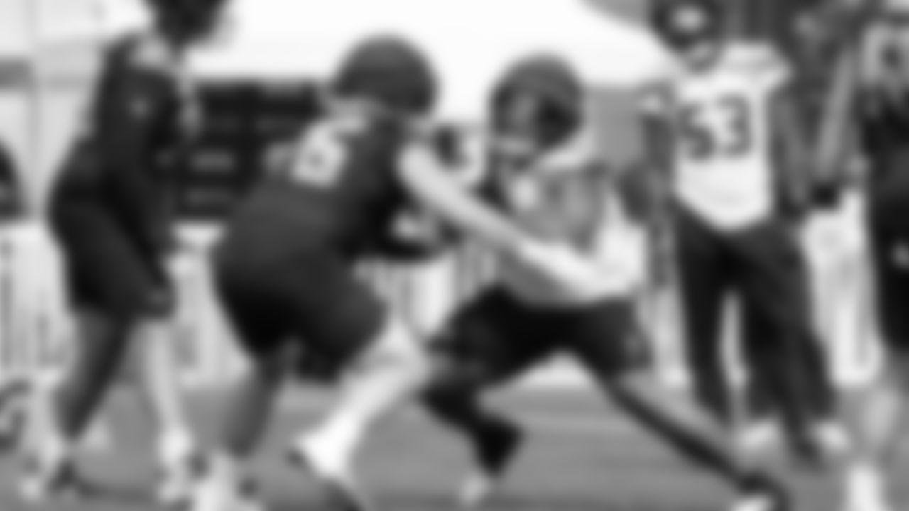 Seahawks defensive tackle Byron Murphy II (91) and guard Grey Zabel (76) practiced on August 13, 2025 at the Virginia Mason Athletic Center.