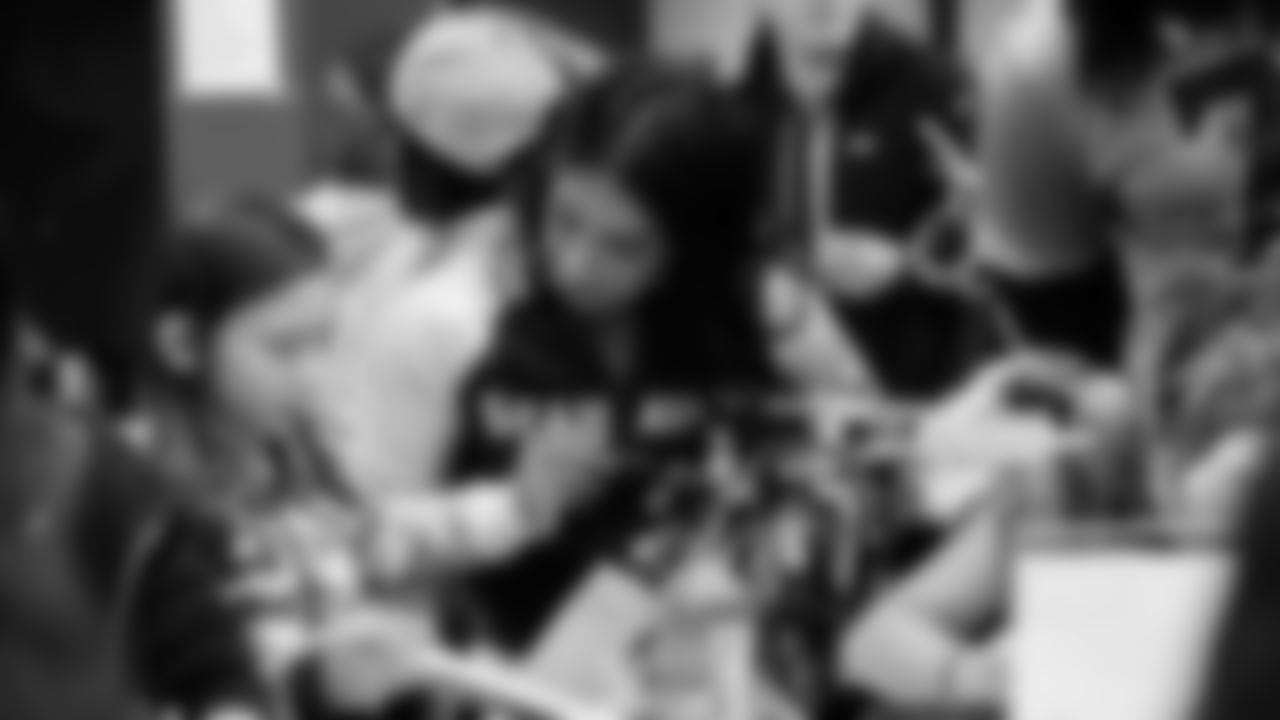 Seahawks Legend Garry Gilliam and Seahawks Dancers surprised teens at the Lake Hills Boys & Girls Club for a fun afternoon of Seahawks activities and crafting. One lucky winner also went home with two tickets to the Divisional Playoff game!