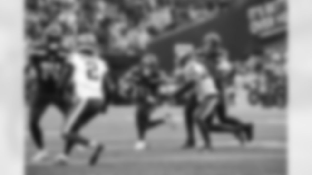 Seahawks wide receiver DK Metcalf (14), Seahawks wide receiver Jaxon Smith-Njigba (11), and Seahawks tight end AJ Barner (88) at the Week 16 matchup against the Minnesota Vikings at Lumen Field on Sunday, December 22, 2024.