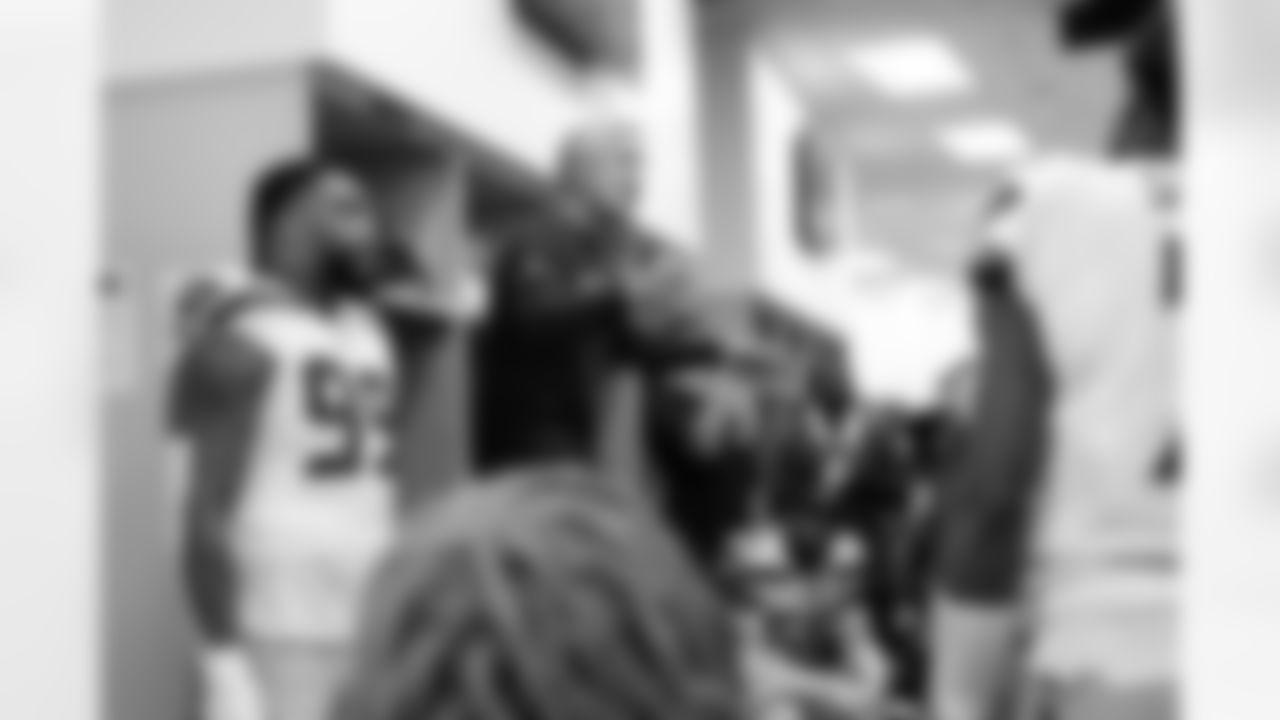 Head coach Pete Carroll talks to the team at halftime.