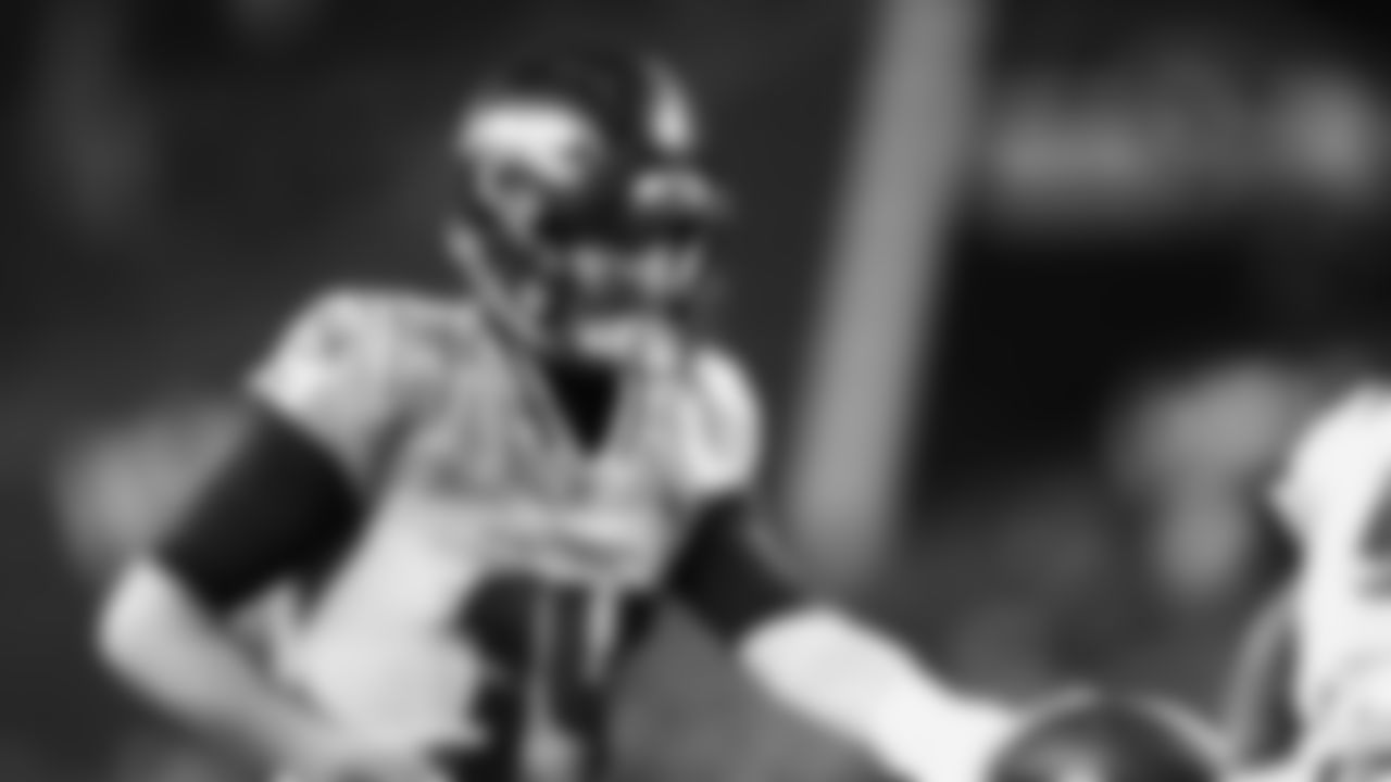 Seahawks quarterback Sam Darnold (14) warms up at Lumen Field for the Week 16 matchup vs. the L.A. Rams.