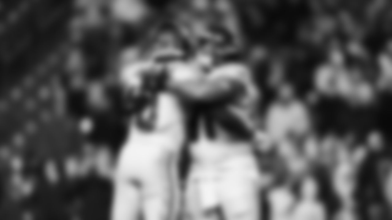 Seahawks defensive end DeMarcus Lawrence (0) and defensive tackle Byron Murphy II (91) warms up at Lumen Field for the Week 16 matchup vs. the L.A. Rams.