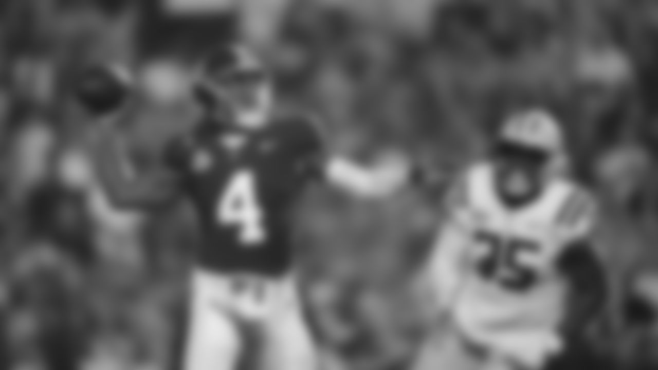 Alabama quarterback Jalen Milroe (4) passes in the first half of an NCAA college football game against LSU in Baton Rouge, La., Saturday, Nov. 9, 2024. (AP Photo/Gerald Herbert)
