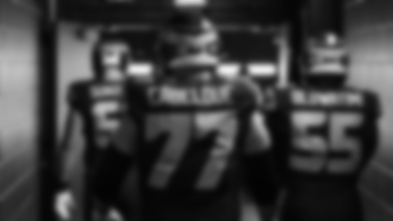 Seahawks guard Bryce Cabeldue (77) walks through the Emerald Queen Casino tunnel club at Lumen Field for the Week 10 matchup vs. the Cardinals.