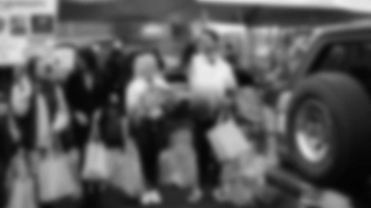 Seahawks Legend Marcus Trufant, quarterback Jalen Milroe, Blitz and the Seahawks Dancers participated in the Tacoma Police Department and Friends Thanksgiving Turkey Giveaway on November 18, 2025.