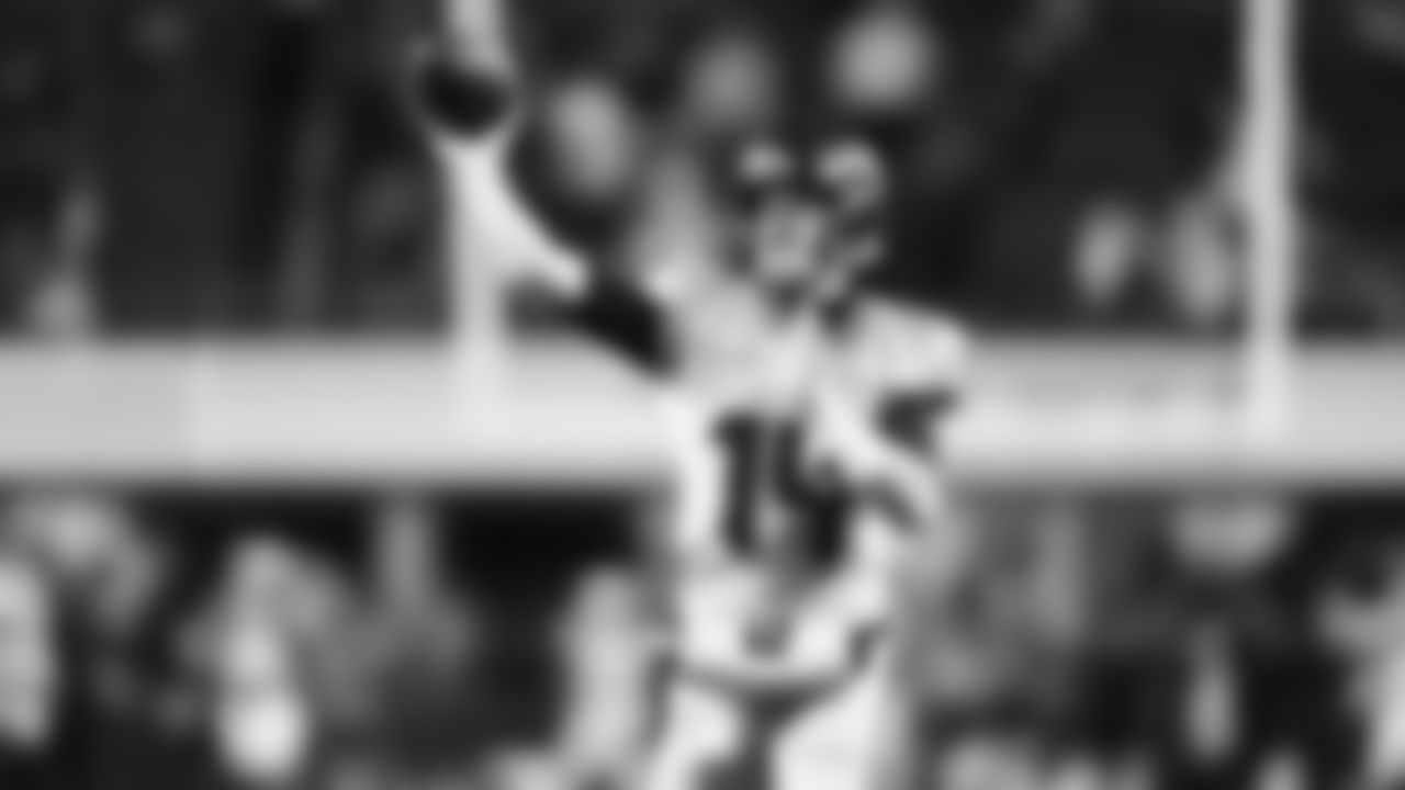 Seahawks quarterback Sam Darnold (14) warms up at Lumen Field for the Week 16 matchup vs. the L.A. Rams.