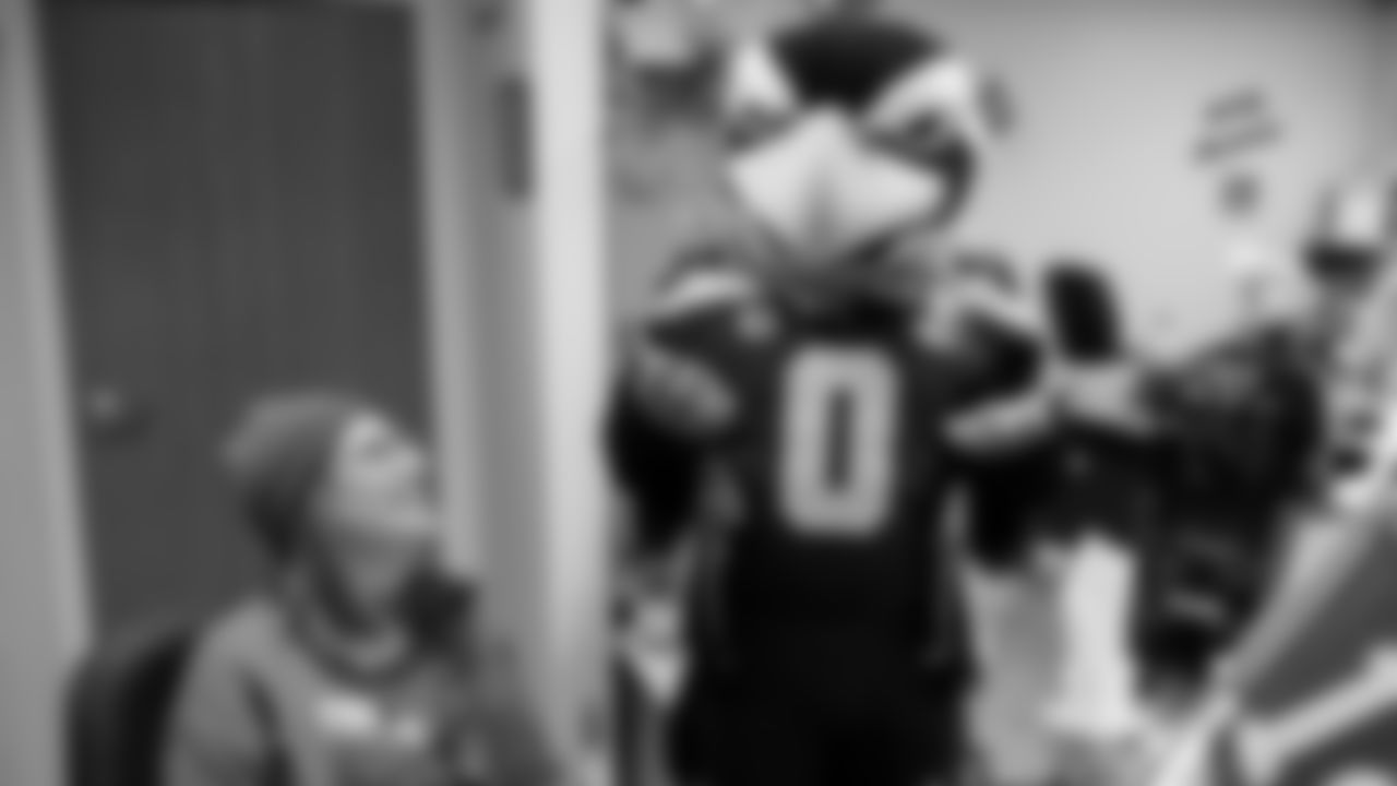 Seahawks Fullback Brady Russell, the Seahawks Dancers, and Blitz spent the day volunteering at Santa's Castle on Joint Base Lewis-McChord to celebrate the holidays and support service members and their families.