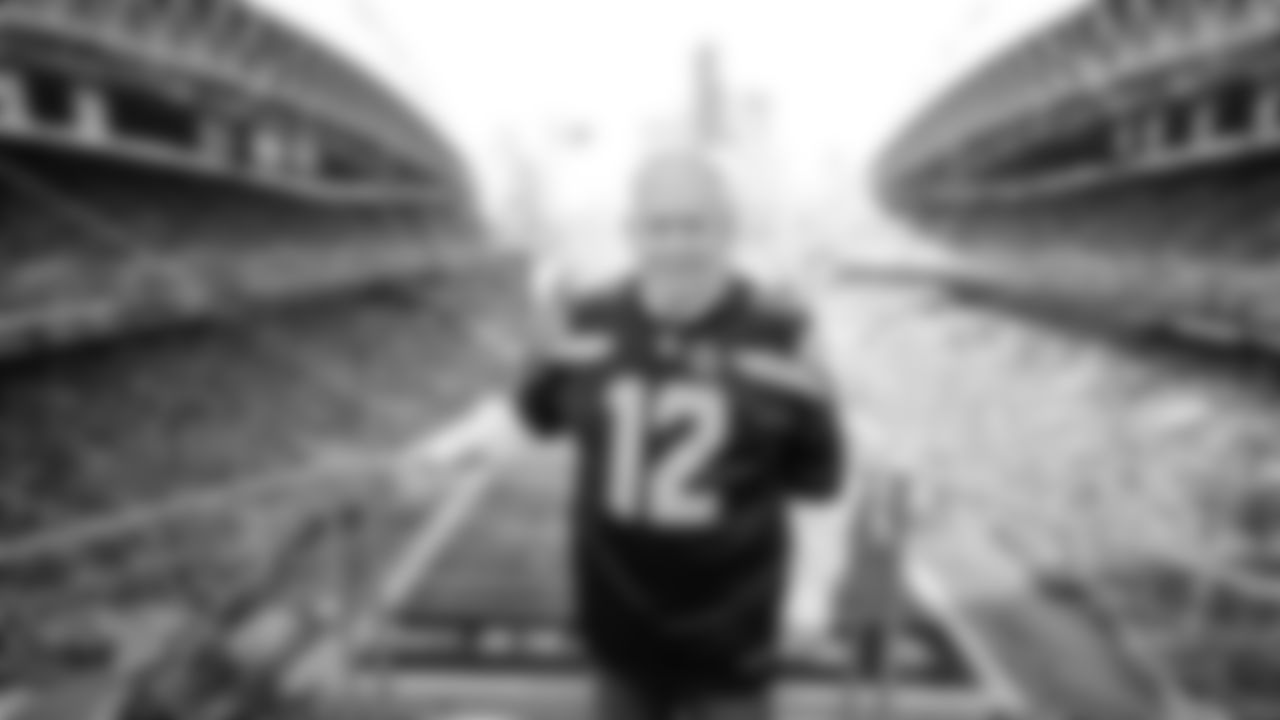 Brigadier General Richard Steve Ritchie "Cinco" of United States Air Force, raised the 12 Flag prior to kickoff of the Week 10 matchup vs. the Cardinals.