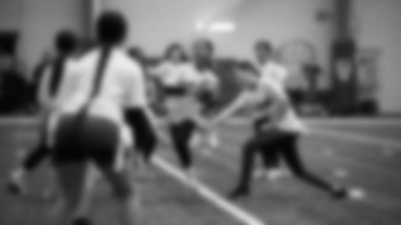 The Seahawks Women's Association packed girls flag kits and hosted a free girls flag football camp at the Seahawks training facility on Saturday, November 8, 2025.