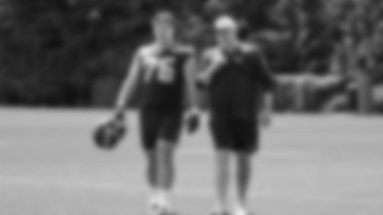 Seahawks guard Grey Zabel (76) and offensive line coach John Benton on day two of OTAs on Thursday, May 29, 2025 at the Virginia Mason Athletic Center.