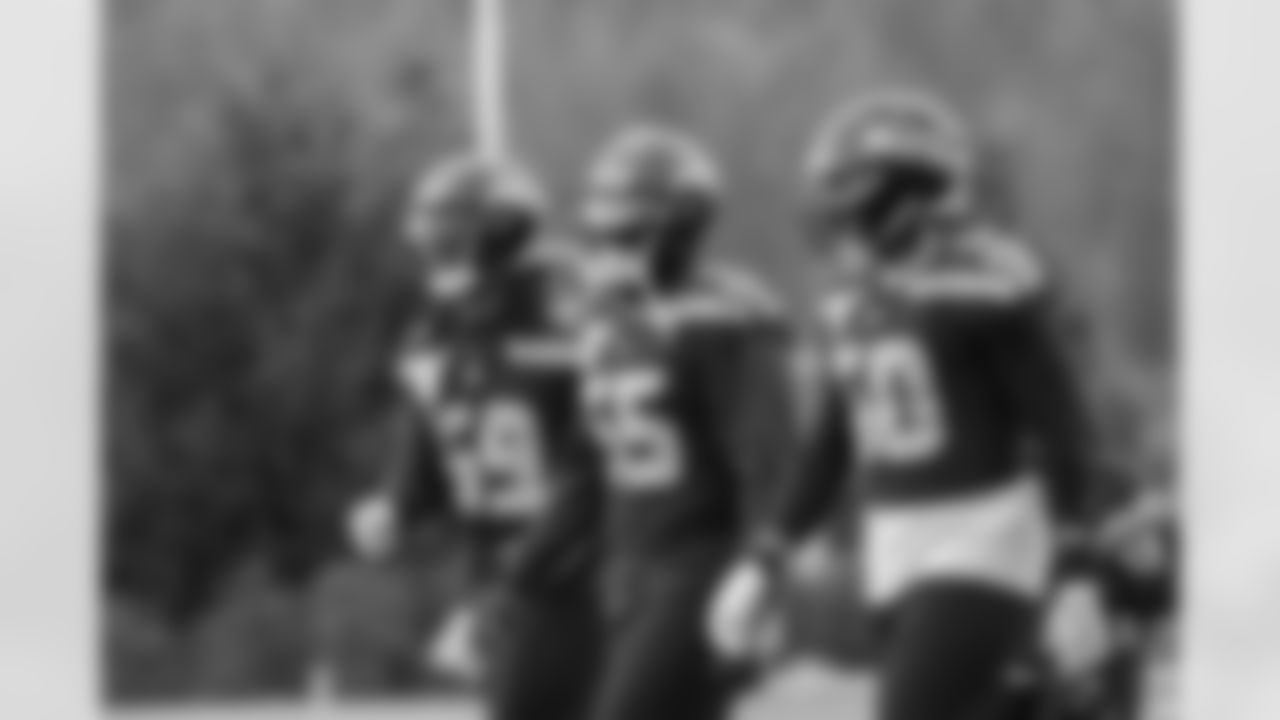 Seahawks linebacker Tyreke Smith (59), linebacker Dre'Mont Jones (55) and linebacker Trevis Gipson (50) practiced at the Virginia Mason Athletic Center on Thursday, December 5, 2024.