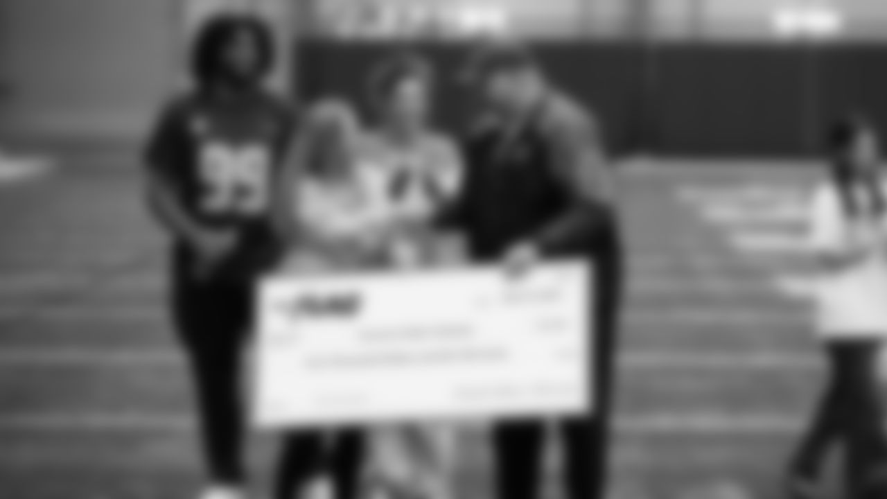 The Seahawks Women's Association packed girls flag kits and hosted a free girls flag football camp at the Seahawks training facility on Saturday, November 8, 2025.