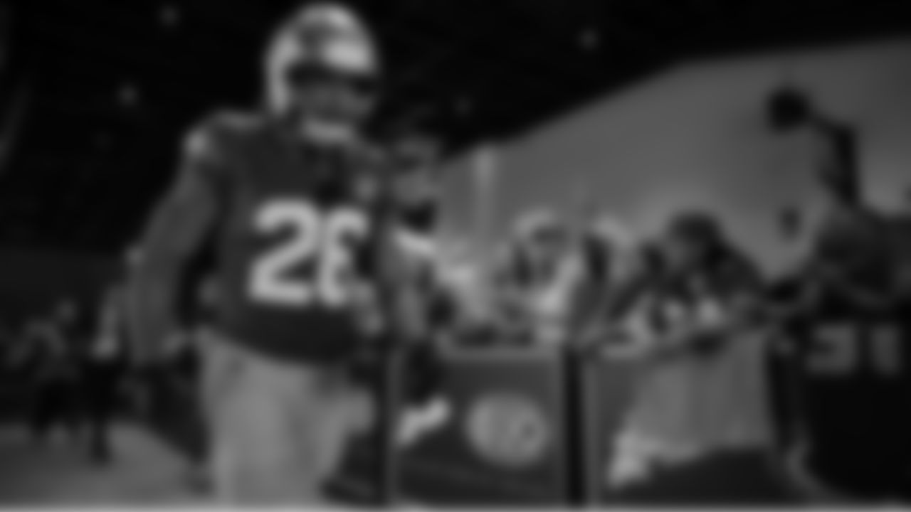 Seahawks running back Zach Charbonnet (26) walks through the Emerald Queen Casino tunnel club at Lumen Field for the Week 5 matchup vs. the Buccaneers.