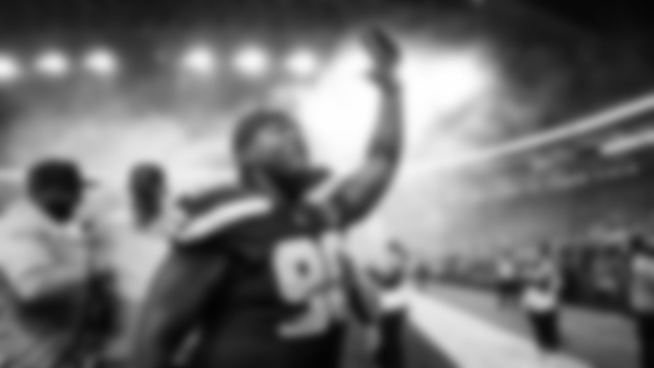 Seattle's Jarran Reed celebrates as he heads to the locker room.