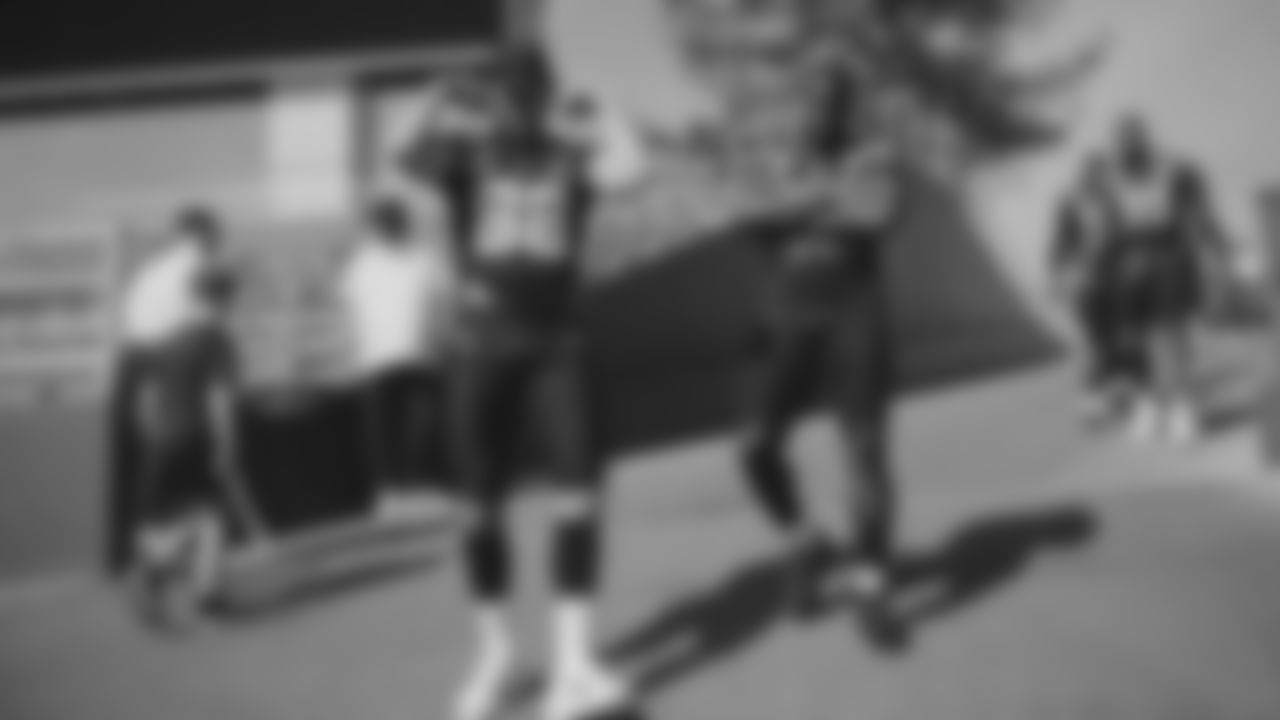 Seahawks tight end AJ Barner (88) and linebacker Derick Hall (58) during the Super Bowl LX team photo on February 7, 2026.