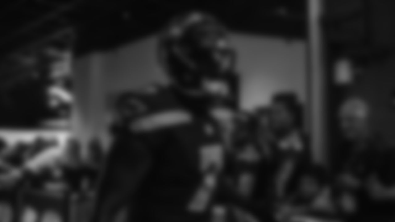 Seahawks linebacker Uchenna Nwosu (7) walks through the Emerald Queen Casino tunnel club at Lumen Field for the Week 3 matchup vs. the Saints on September 21, 2025.