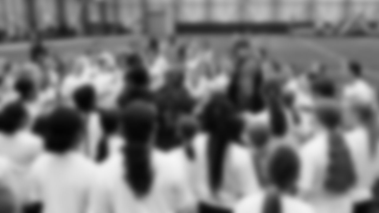 The Seahawks Women's Association packed girls flag kits and hosted a free girls flag football camp at the Seahawks training facility on Saturday, November 8, 2025.