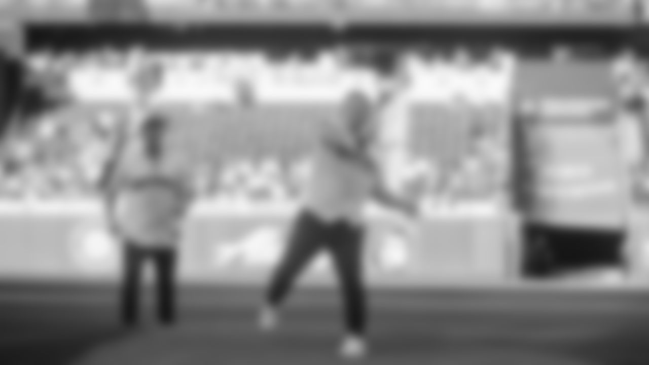 Seahawks head coach Mike Macdonald was joined by comedian Adam Ray as they tossed out the first pitch for the Mariners vs. Yankees game on May 12, 2025 at T-Mobile Park.
