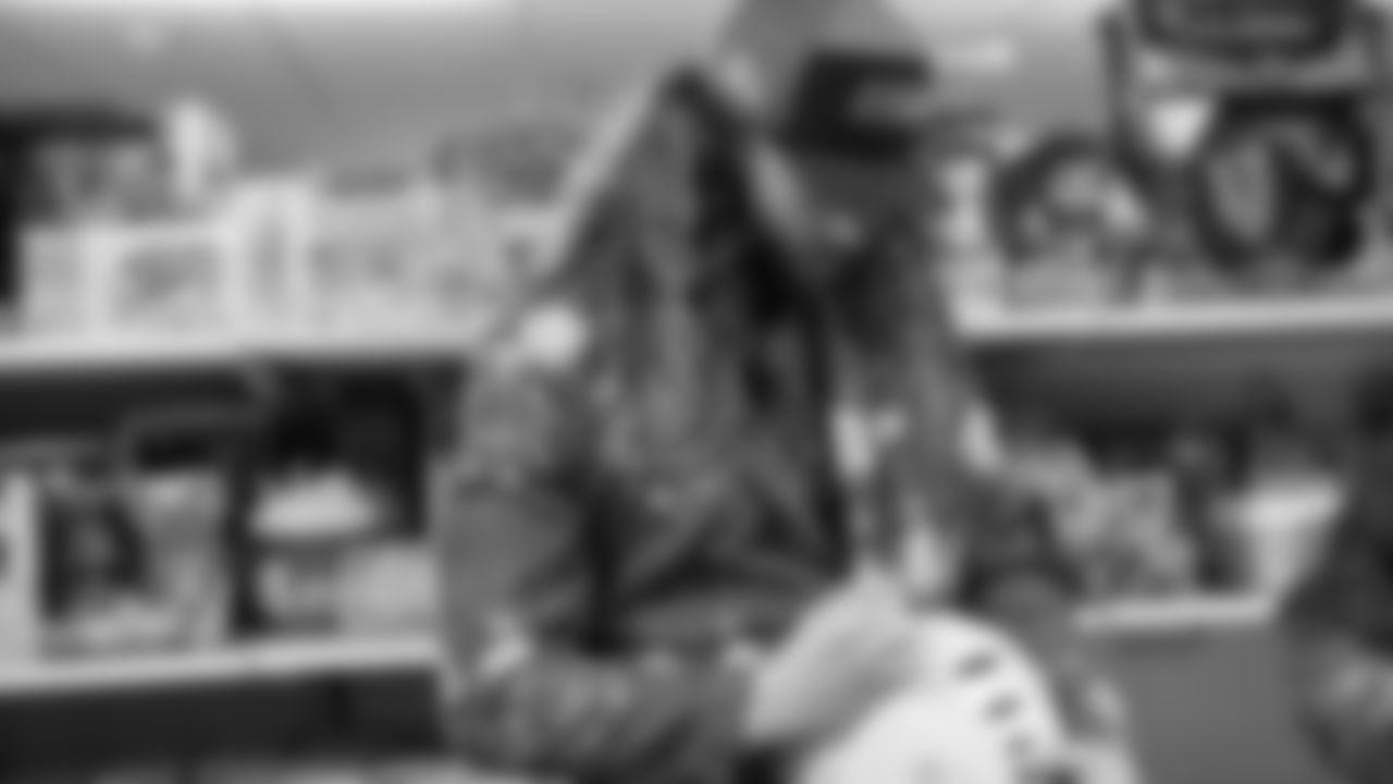 Seahawks Fullback Brady Russell, the Seahawks Dancers, and Blitz spent the day volunteering at Santa's Castle on Joint Base Lewis-McChord to celebrate the holidays and support service members and their families.