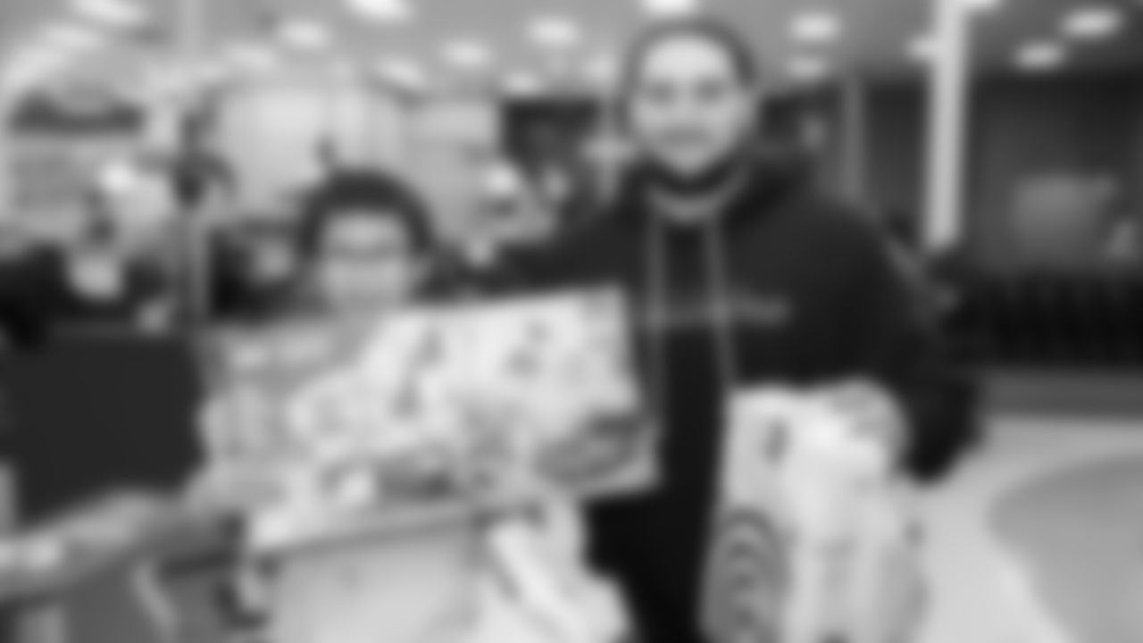 Seahawks offensive lineman Josh Jones was joined by fellow offensive linemen as they hosted a holiday shopping spree for kids from the Boys & Girls Club on December 9, 2025.