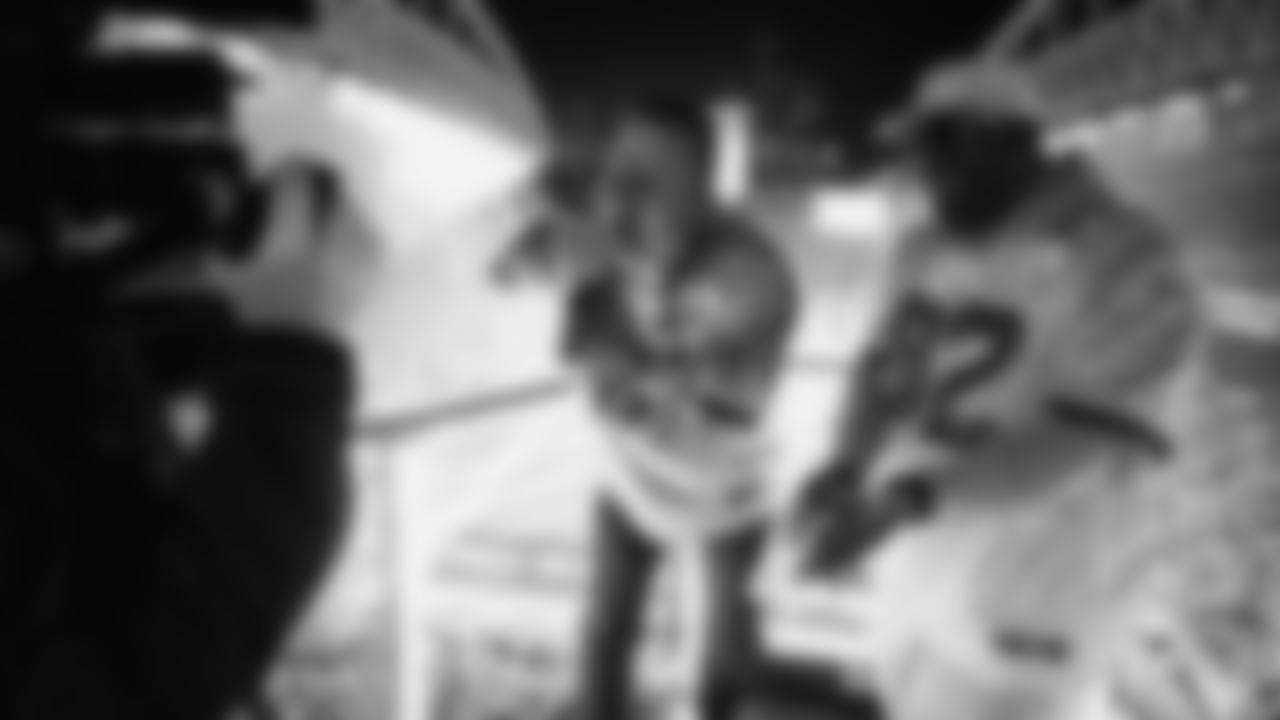 Seahawks Legends Chad Brown and Darrell Jackson raise the flag before the Week 16 Rivalries matchup against the Rams on December 18th, 2025