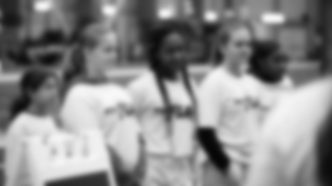 The Seahawks Women's Association packed girls flag kits and hosted a free girls flag football camp at the Seahawks training facility on Saturday, November 8, 2025.