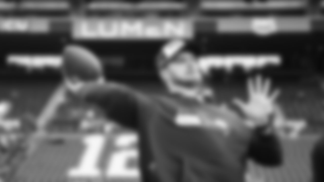 Seahawks quarterback Sam Darnold (14) warms up at Lumen Field for the Week 15 matchup vs. the Indianapolis Colts.